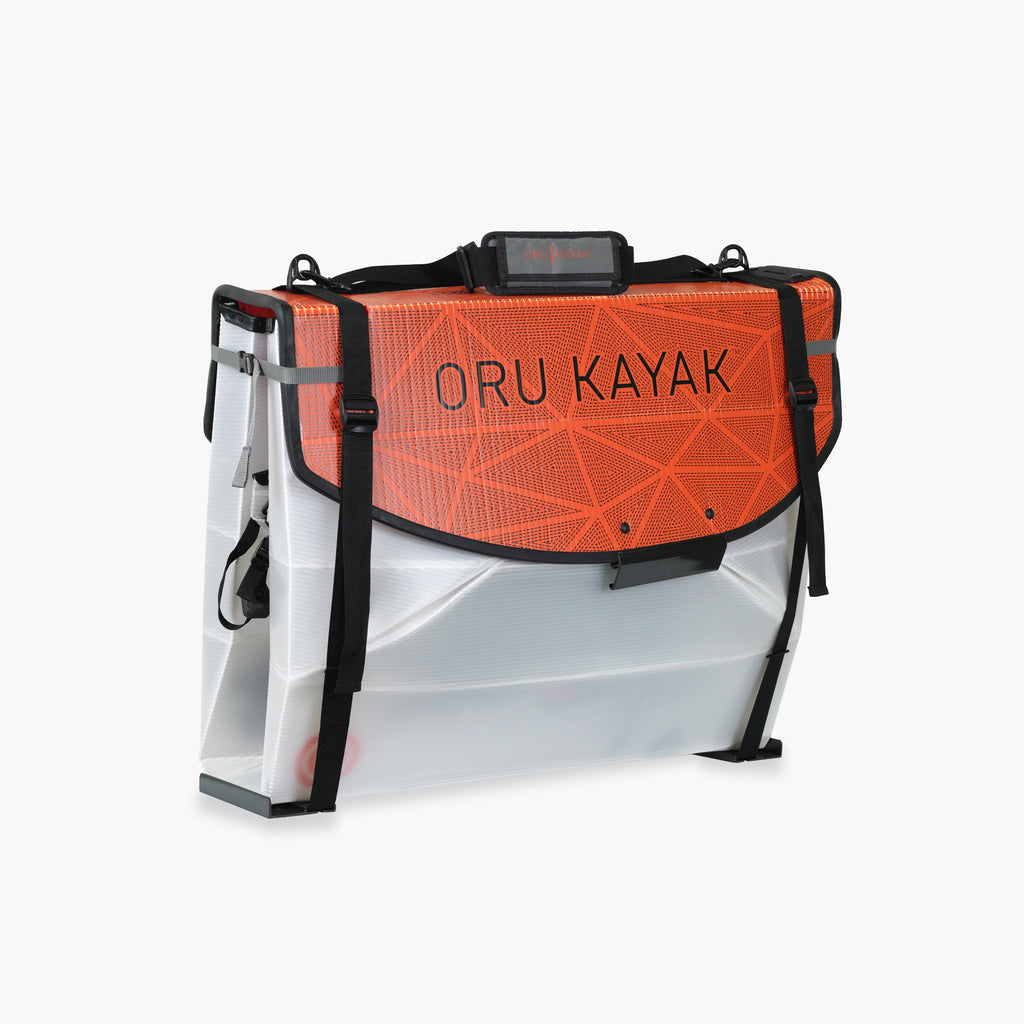 Folded white Oru Kayak Bay model in white in box form.