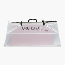 Folded white Oru Kayak Inlet model in white in box form.