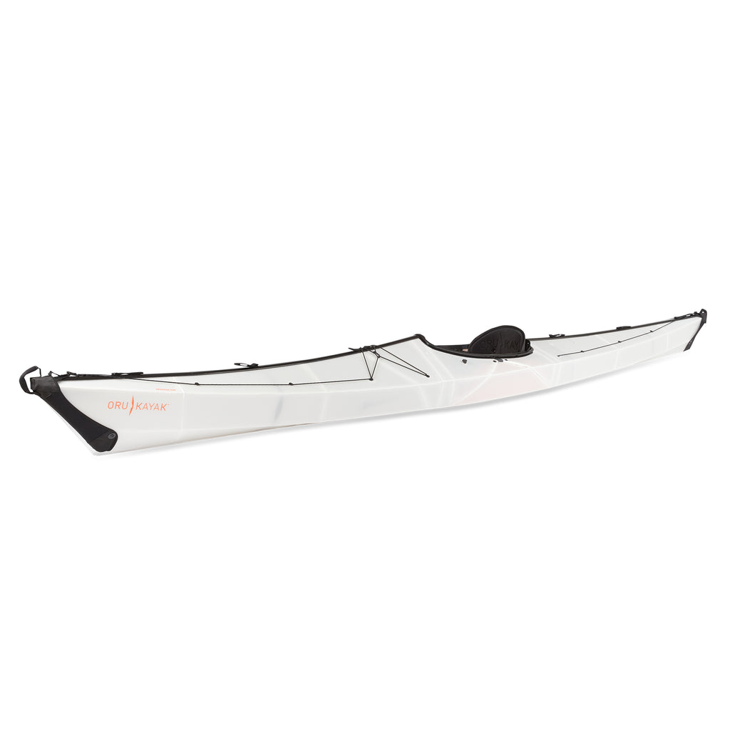 Side view of the Oru Kayak Coast model in white.