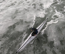 Man paddling on the Coast XT Kayak