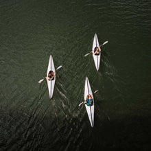 People paddling on their bay St kayak on the river
