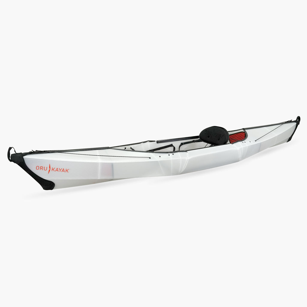 Side view of the Oru Kayak Beach Sport model in white.