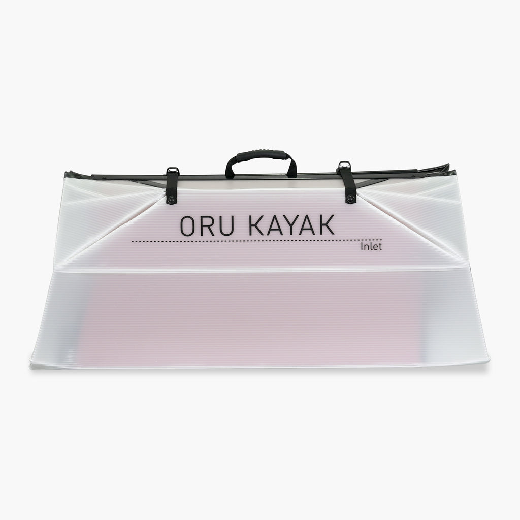 Folded white Oru Kayak Inlet model in white in box form.