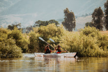 2 people kayaking on a haven tt kayak