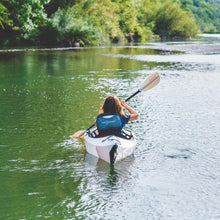 Woman kayaking on her inlet kayak